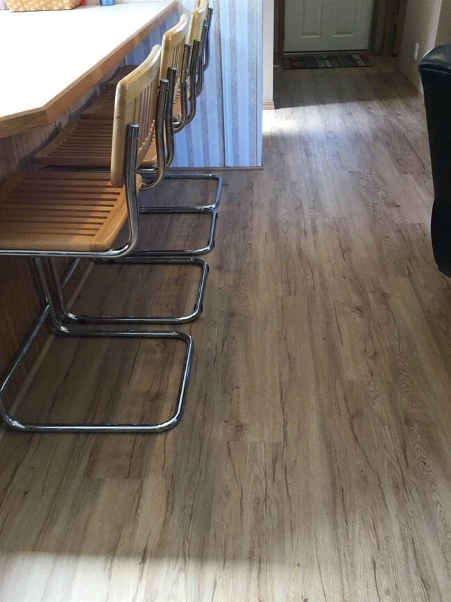 Engineered flooring throughout