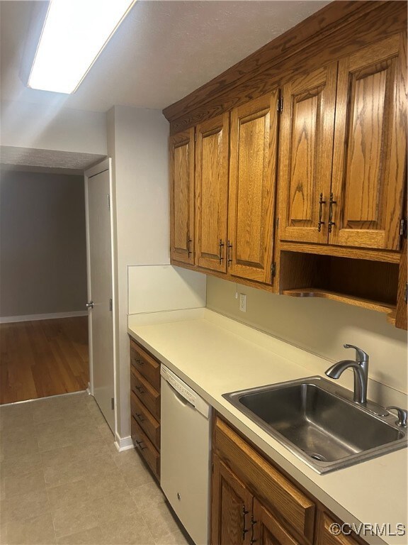 Kitchen featuring sink and dishwasher