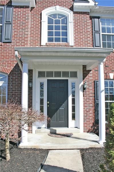 A covered porch to greet your guests!