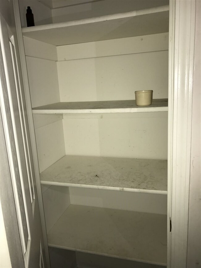 nice big closet with built in shelves