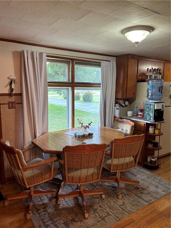 Dining area featuring wood-type flooring