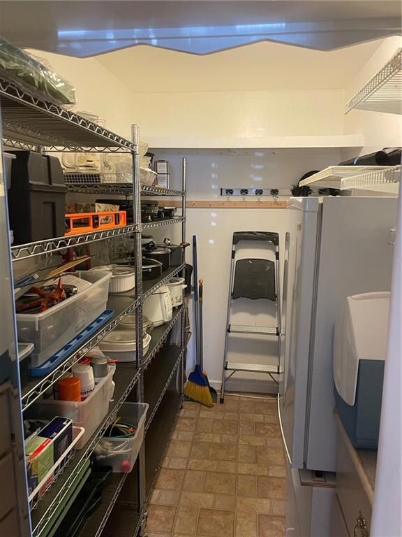 large storage closet adjacent to dining room.