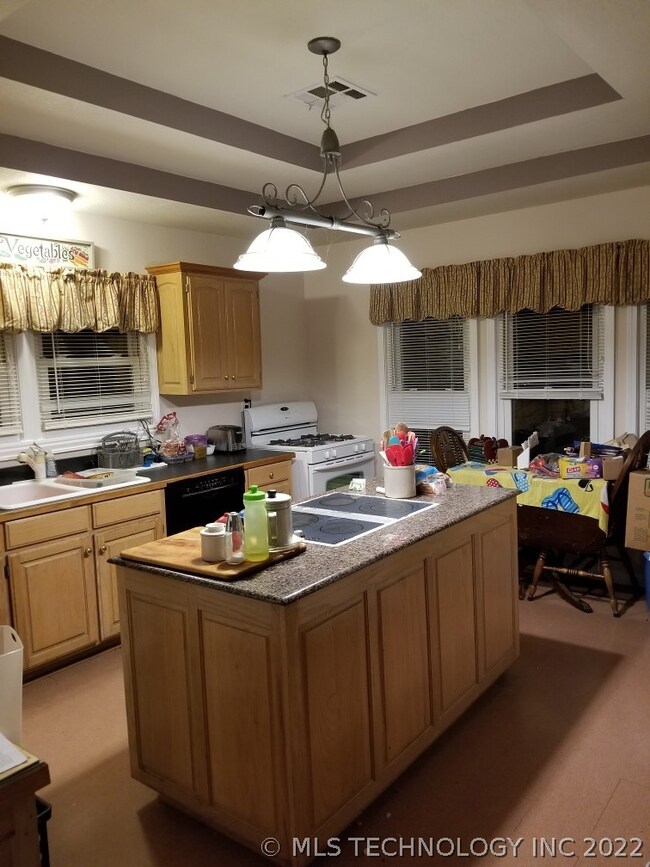 Large kitchen with eat in area. Lots of storage in