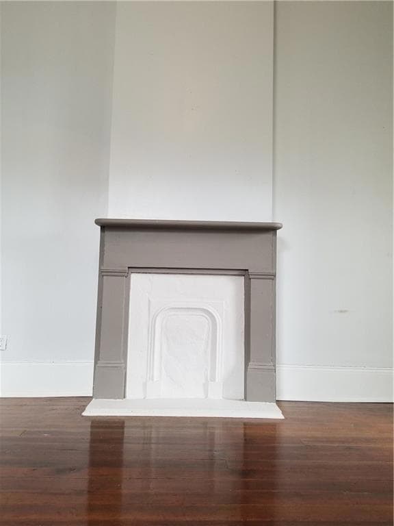 Historic ornamental mantelpiece in second room...