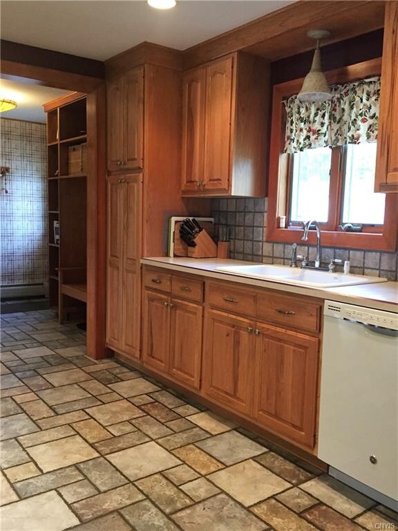 Spacious kitchen with plenty of cabinets for stora