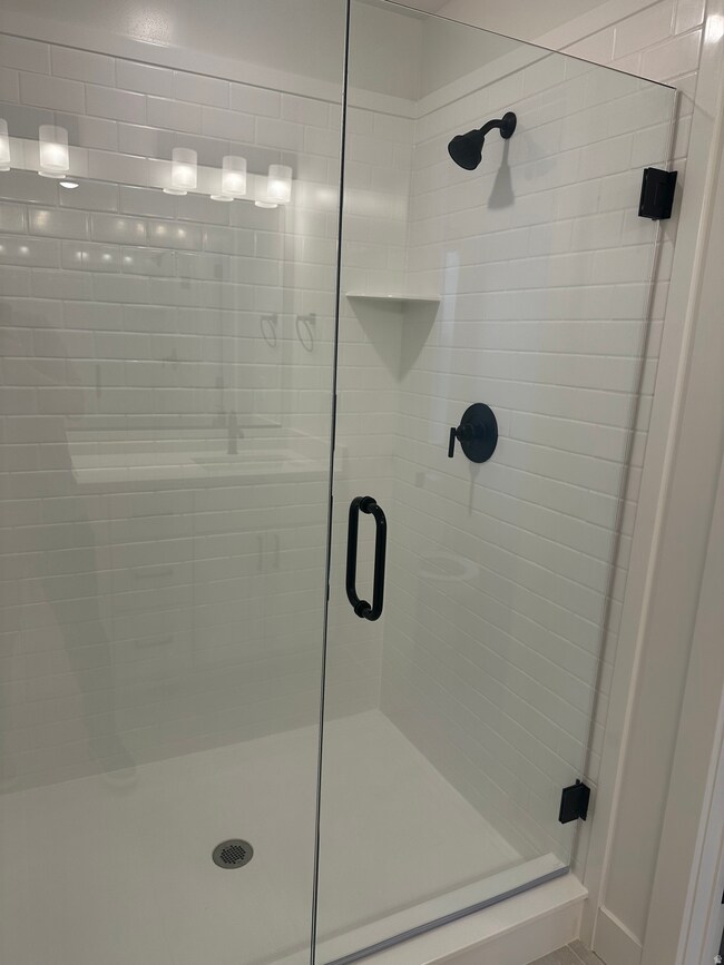 Bathroom featuring a stall shower
