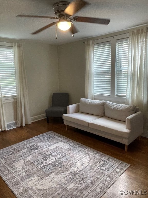 Living area featuring plenty of natural light, cei