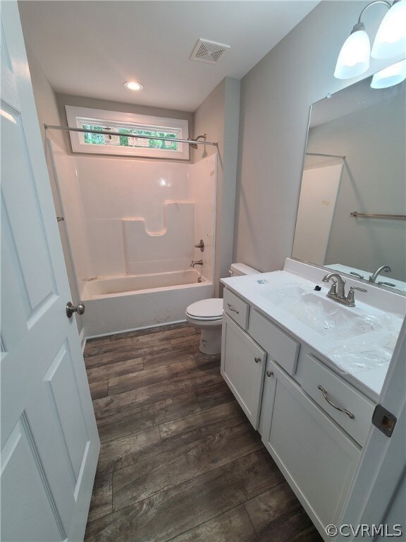Full bathroom with shower / tub combination, toile
