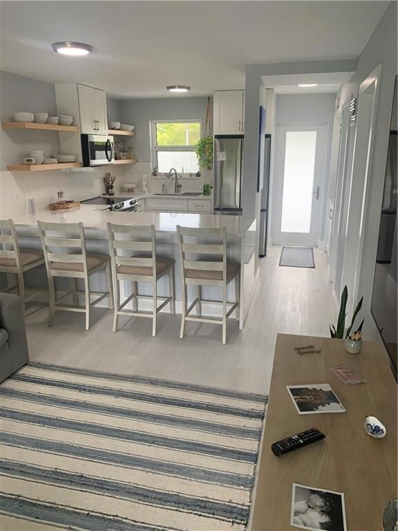 Front Door & Kitchen
