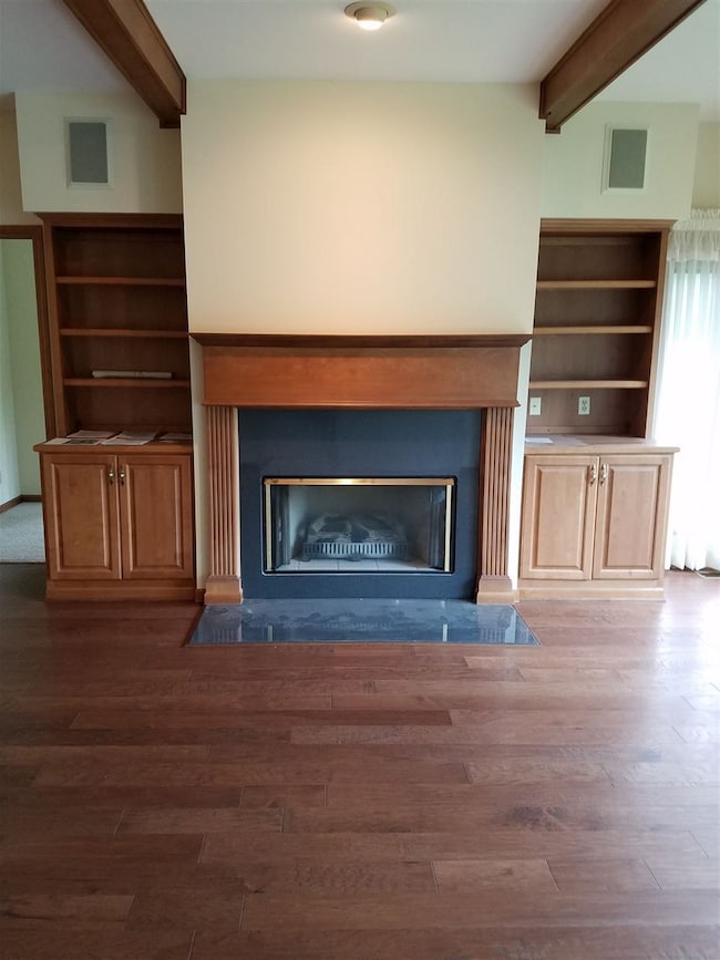 This wonderful gas fireplace is in the living room