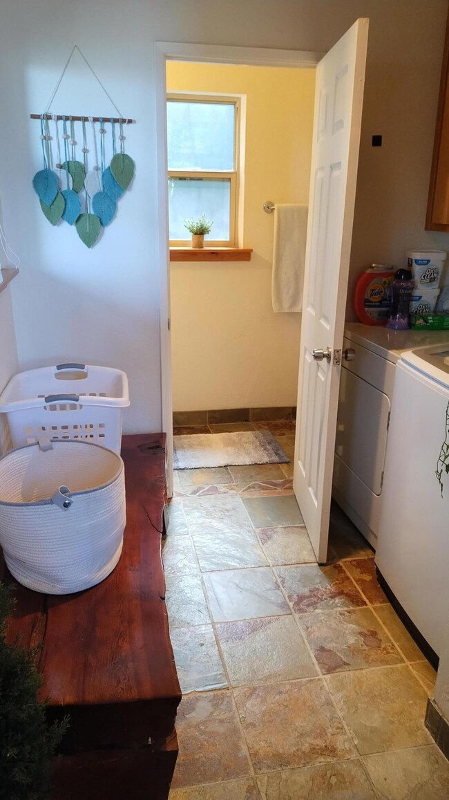 6-Laundry and guest bath from entry left