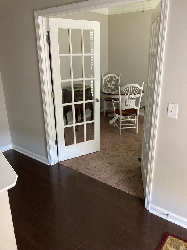 This is the foyer, showing the entrance to the flex space just inside the front door.  It could be used as an office, a dining room, a den, etc.