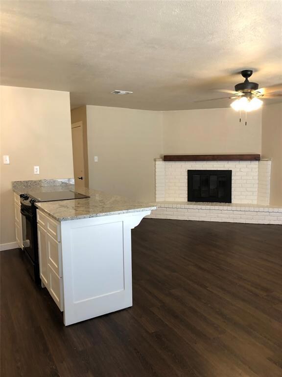 Kitchen looking in to the living area