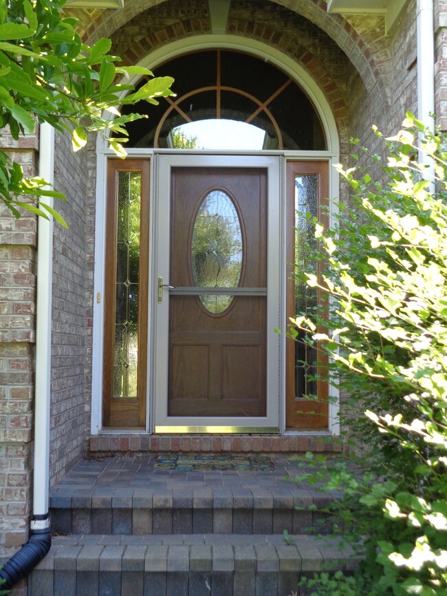 WITH TIMELESS STYLE,  ARCHED ENTRANCE WITH FULL BR