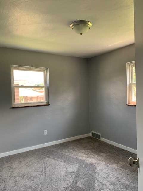 SECOND BEDROOM IS FRESHLY PAINTED WITH NEW CARPETI