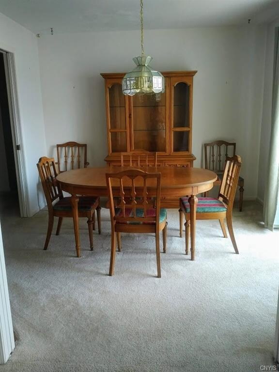 Dining room with sliders to covered patio