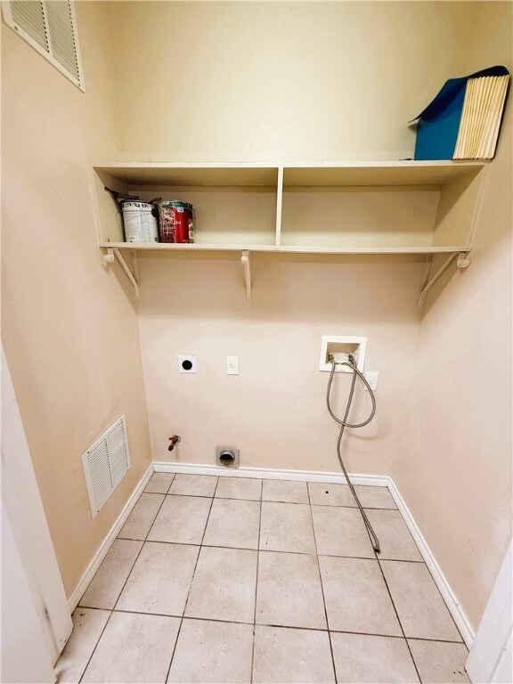 Laundry area with hookup for a washing machine, ti