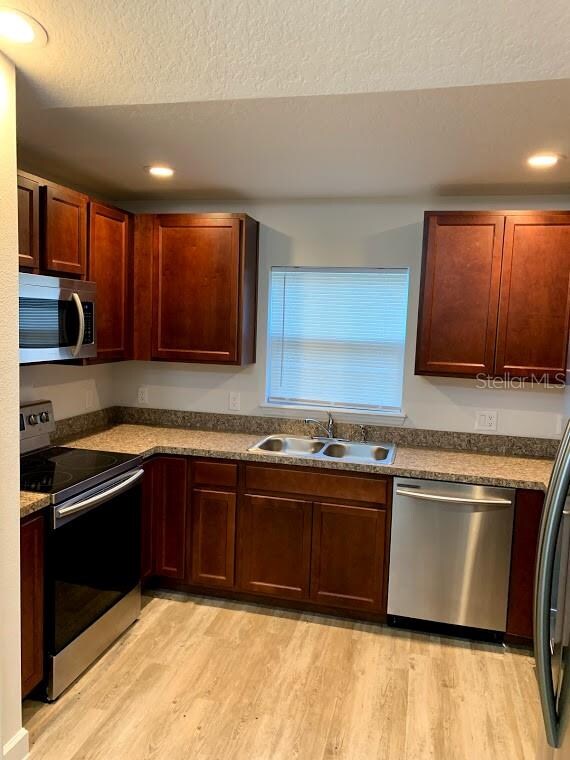 New Range; New Microwave; New Dishwasher; New Refrigerator! Love this Kitchen!