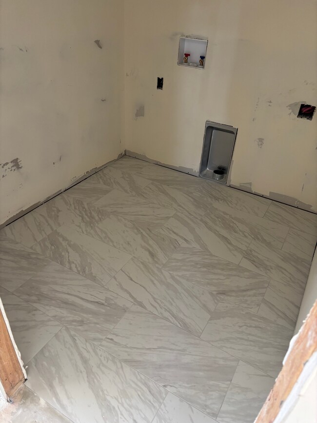 Washroom with hookup for a washing machine