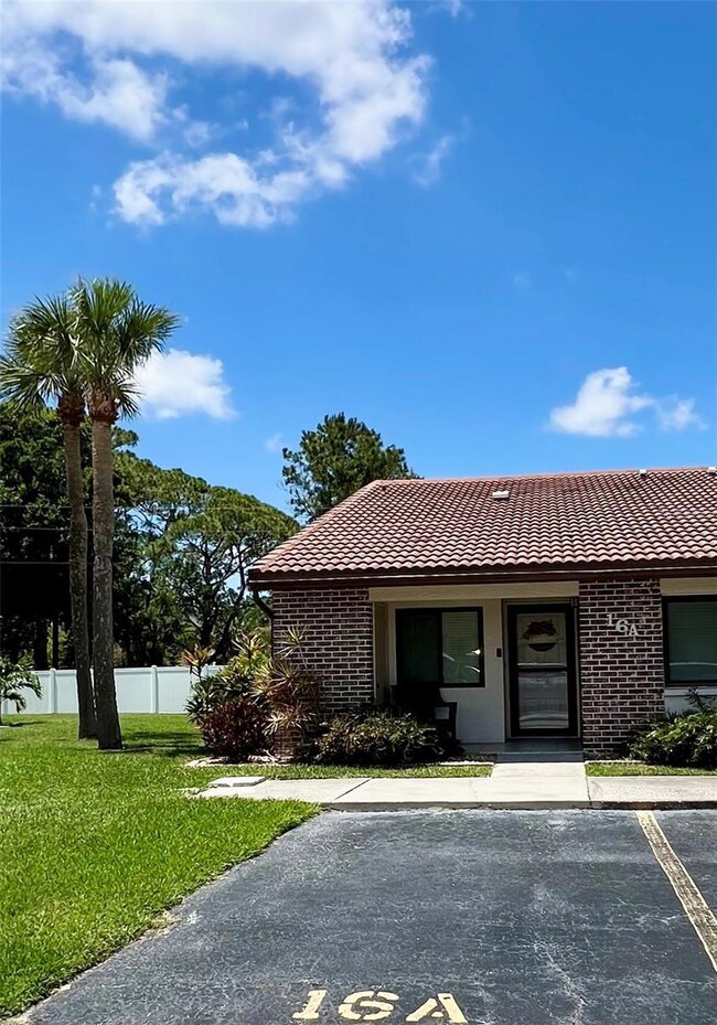 Front of home and parking spot out front