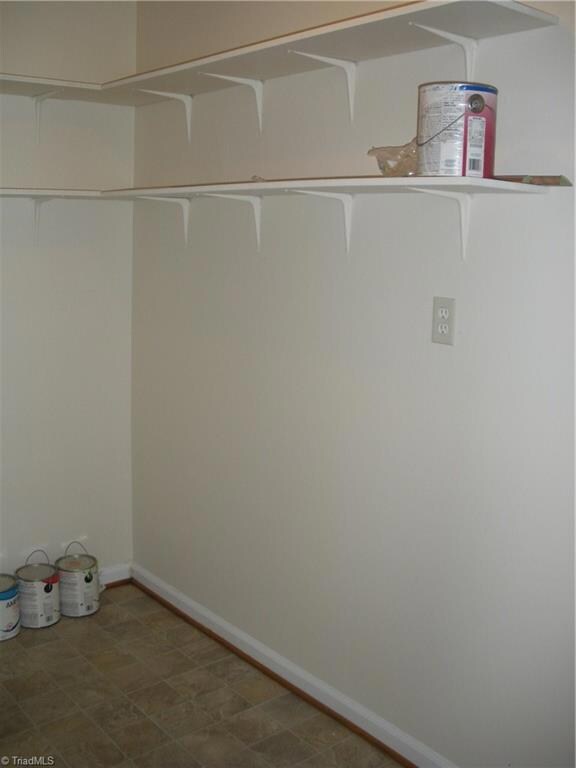 Storage area/office area located on main level off the front entrance.