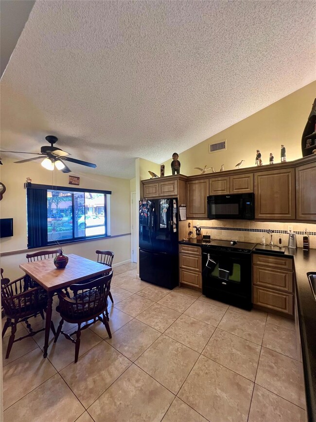 7123 Mimosa Way, Tamarac, FL 33321 - photo 6