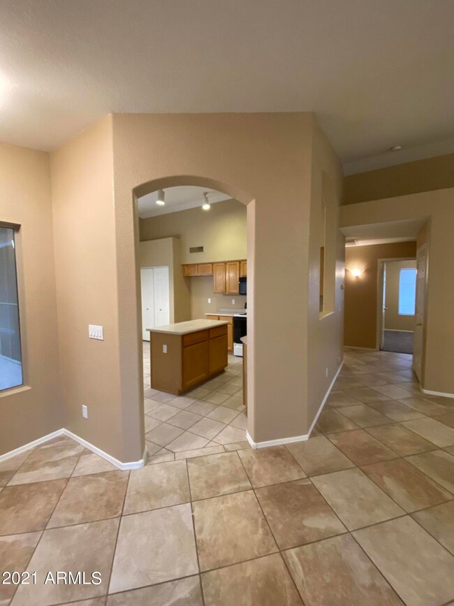 LOOKING INTO KITCHEN