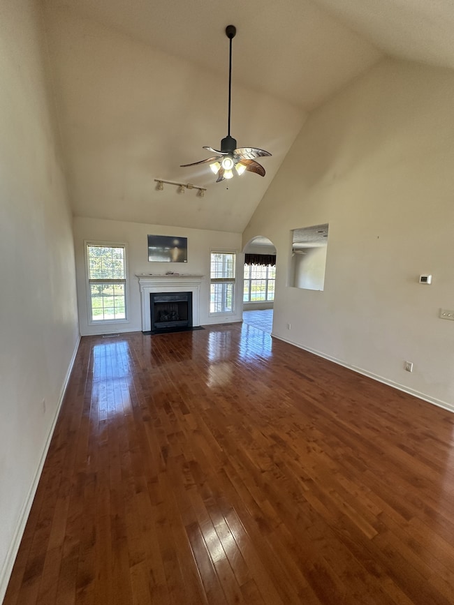 Very large living room with natural gas fireplace.