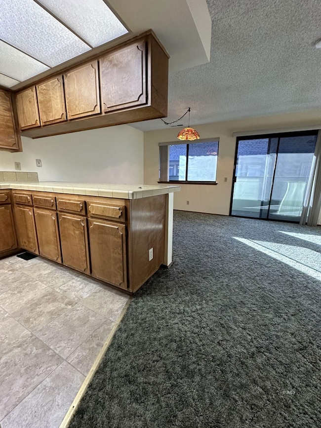 Top of stairs to dining & kitchen entry