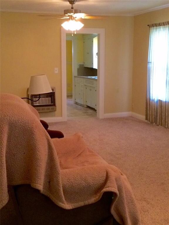 View of living/dining room looking west toward kit
