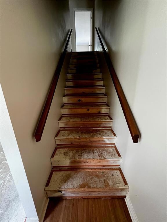 Staircase leads to second floor with two bedrooms 