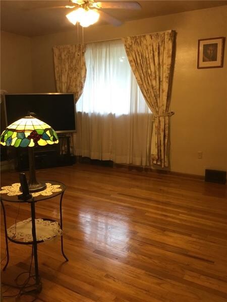 The living room is very spacious and the floors ar