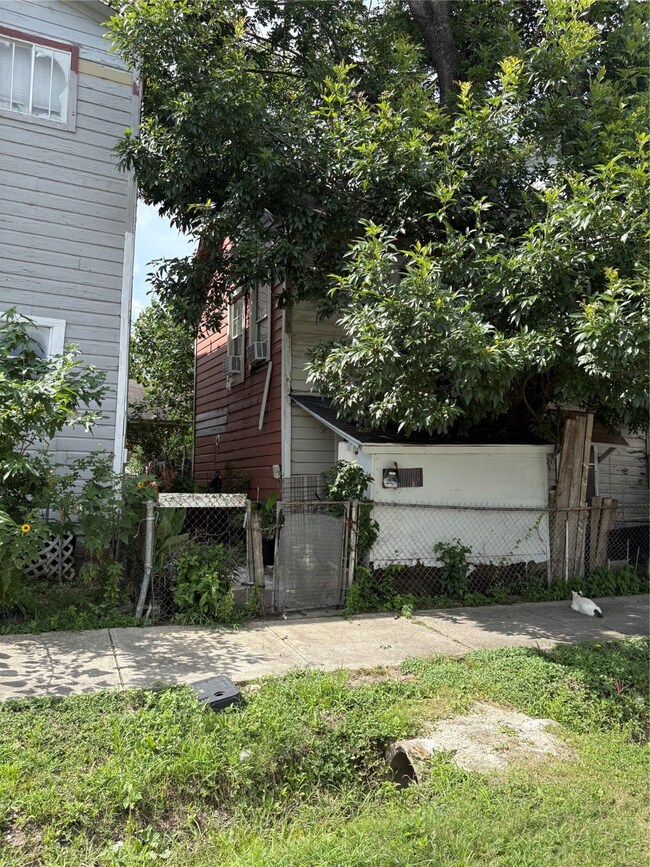 Two charming garage apartments in the back offer v