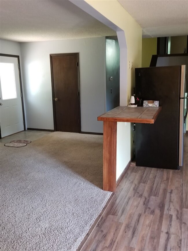 Open Living Room/Dining/Kitchen area