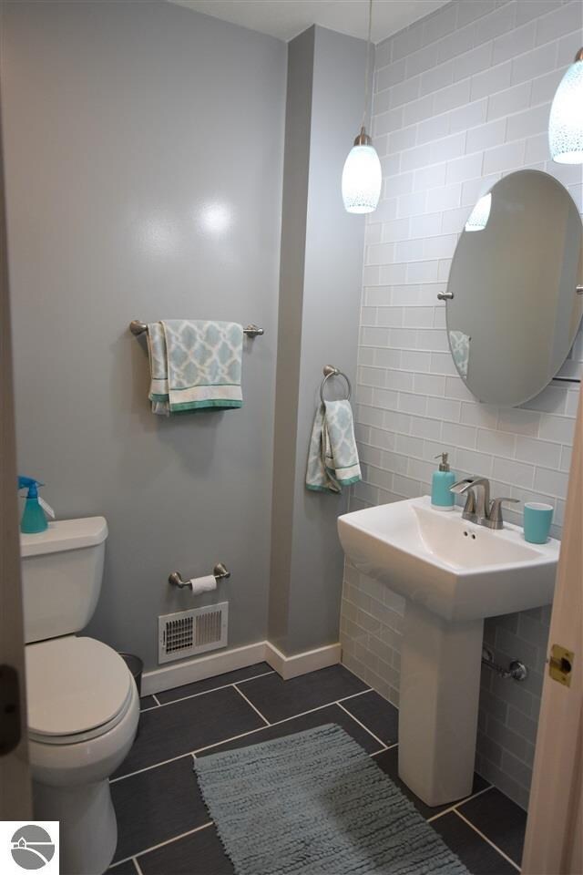Freshly updated bathroom that is a must see.