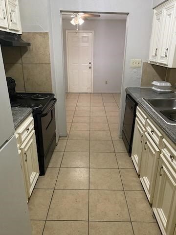 Kitchen with free standing stove.