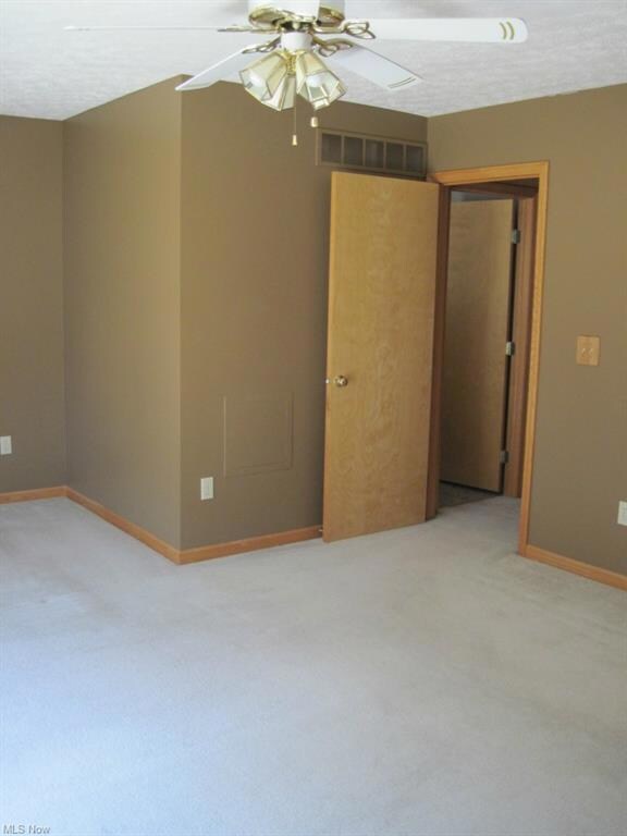 Master bedroom; door leads to hallway and hallway 