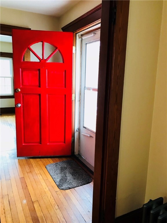 entrance with cheery red door