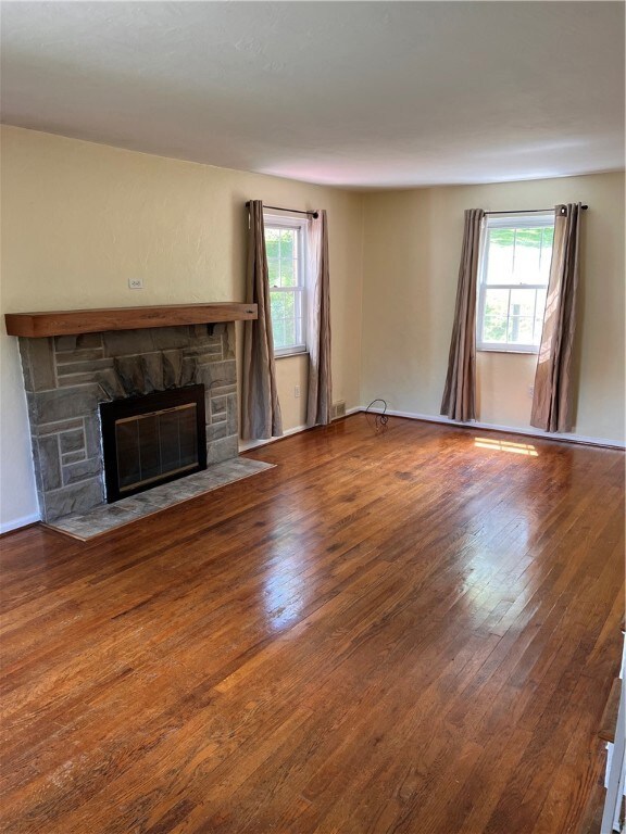 Hardwood floors and wood burning fireplace
