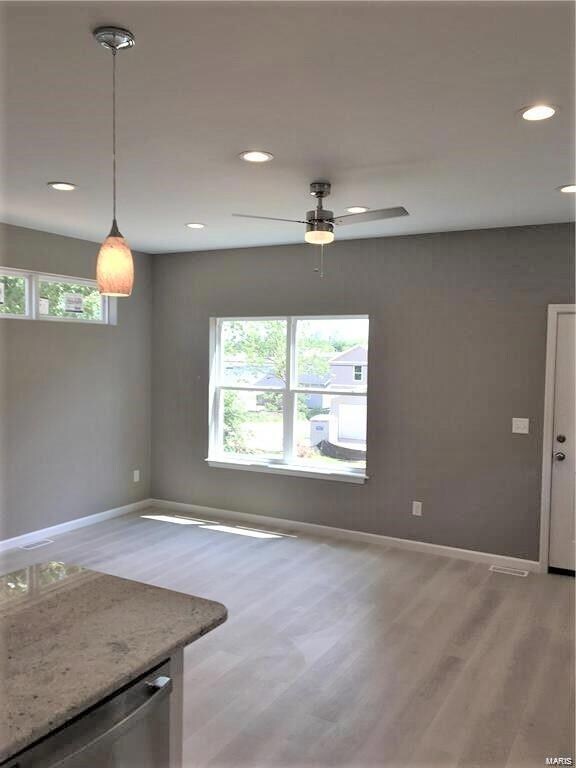 Open floor plan looking from ktichen into living r