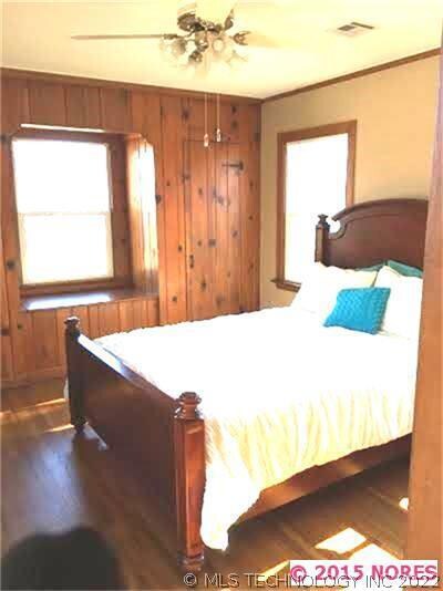 Back bedroom has double closets and window seat.