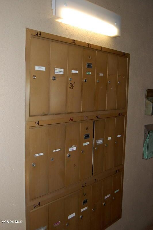 Mail Boxes Next to Elevator