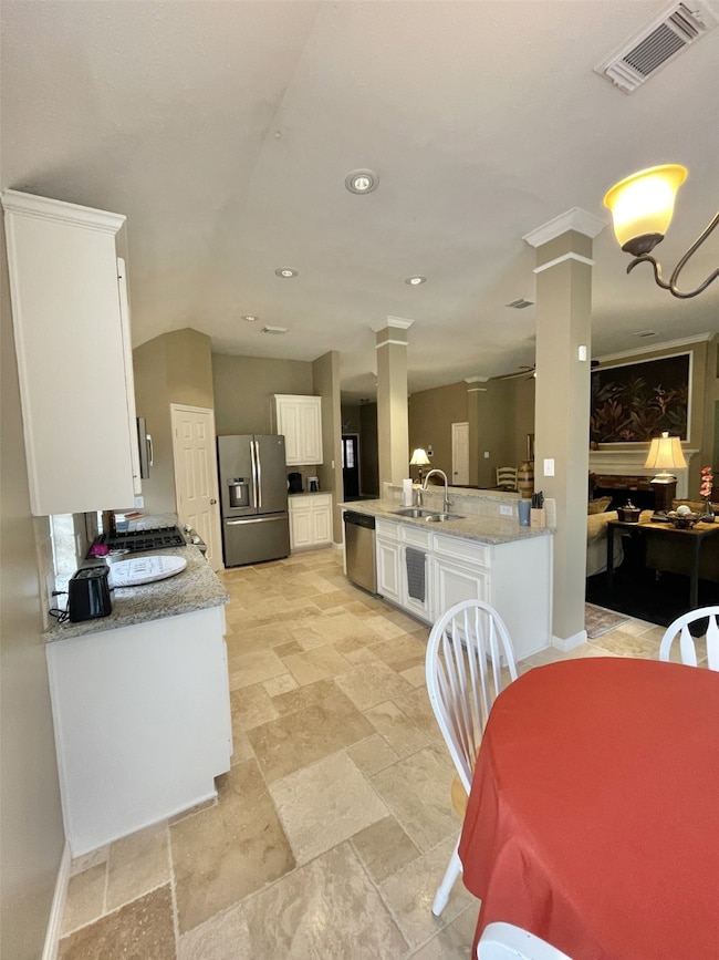 Great kitchen was gas cooktop, spacious pantry, and some cooking supplies.