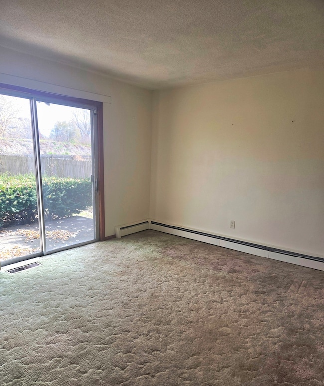 Patio door leading to the back yard. Half-bath att