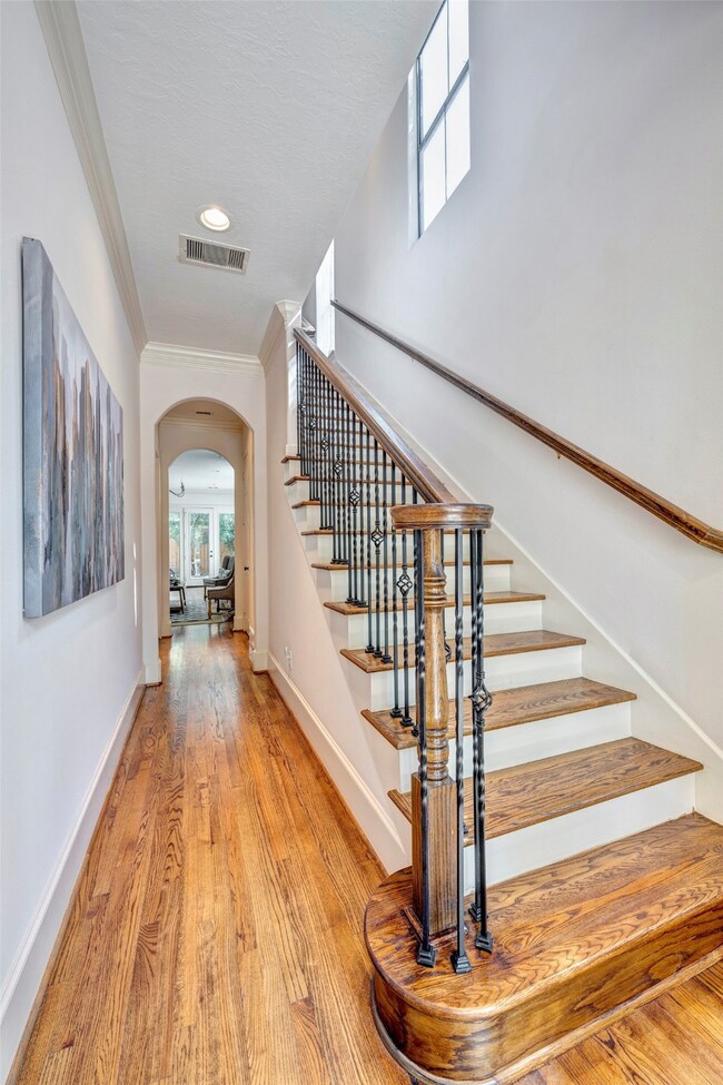 Entrance greets you with fresh light, classic wood