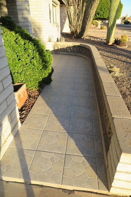 Tiled walkway to front porch