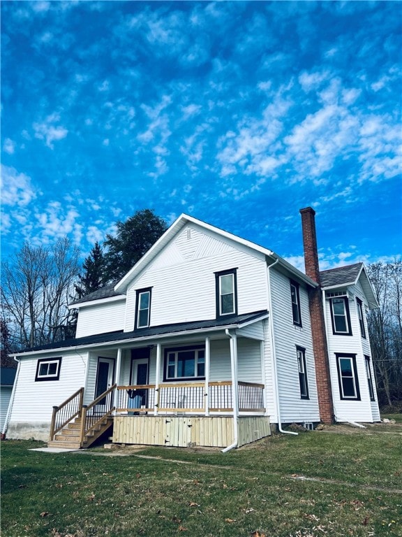 Large back porch with access into kitchen and mud