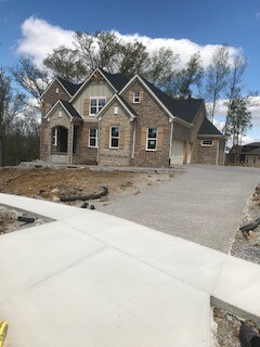 Newcastle II- Front Exterior of actual home. For comp purposes only. 