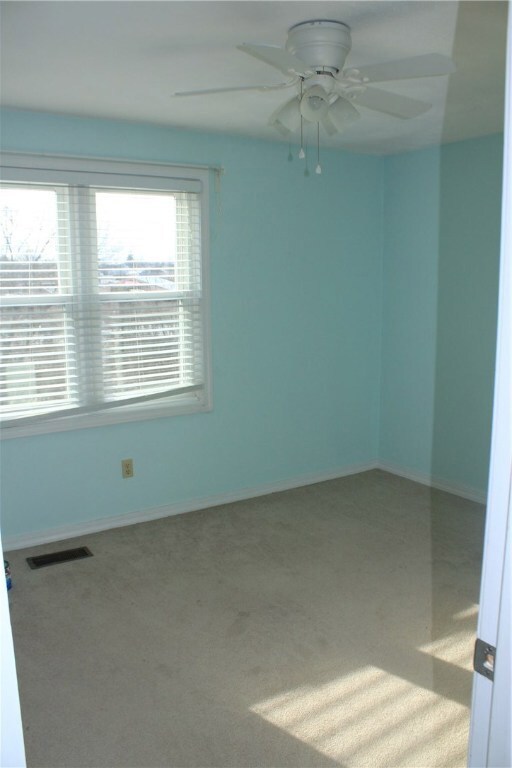 First bedroom with closet and attached bath, facin