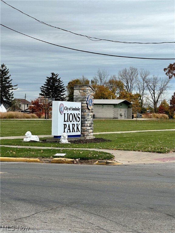 Community sign with a lawn